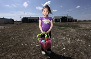 Cree child, Attawapiskat, Canada. Image source.